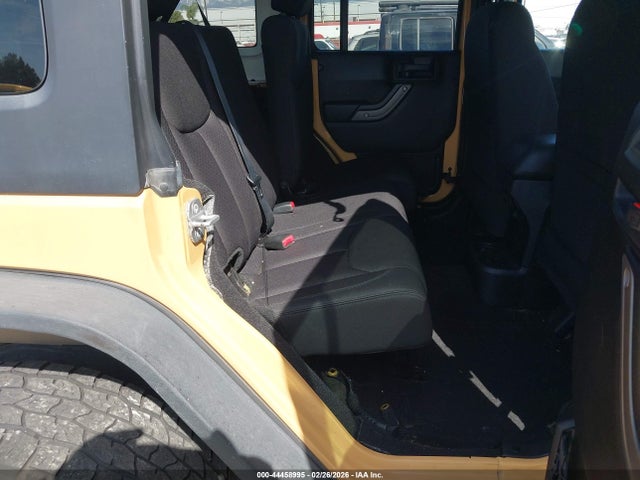 1C4BJWDG4EL148691 Jeep Wrangler Unlimited Sport