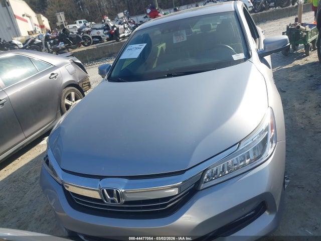 Auction sale of the 2017 Honda Accord Hybrid Touring, vin: JHMCR6F71HC013827, lot number: 44477054