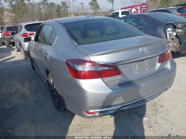 Auction sale of the 2017 Honda Accord Hybrid Touring, vin: JHMCR6F71HC013827, lot number: 44477054