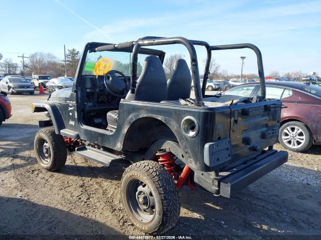 1999 JEEP WRANGLER 1J4FY19SXXP423287 Photo 2