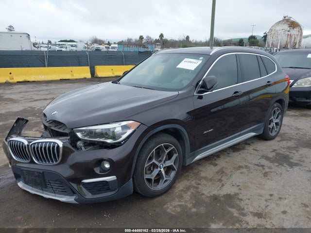 2016 BMW X1 WBXHT3C35G5F64957 Photo 1