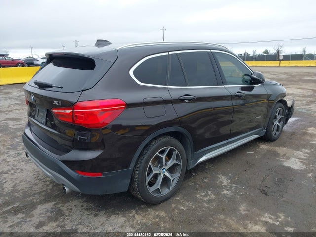 2016 BMW X1 WBXHT3C35G5F64957 Photo 3