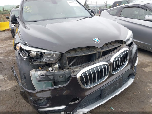 2016 BMW X1 WBXHT3C35G5F64957 Photo 5