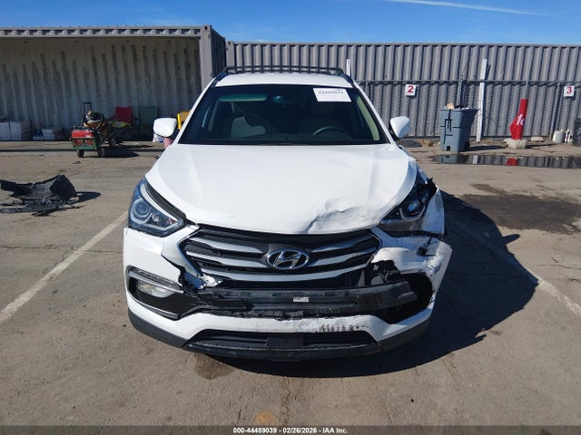 5NMZU3LB8HH013696 Hyundai Santa Fe Sport 2.4l