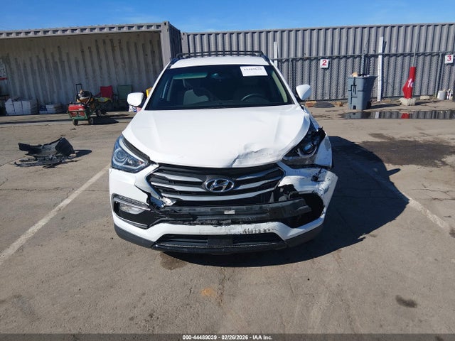 5NMZU3LB8HH013696 Hyundai Santa Fe Sport 2.4l
