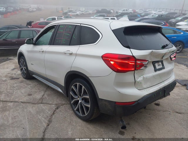 2017 BMW X1 WBXHT3C38H5F70575 Photo 2