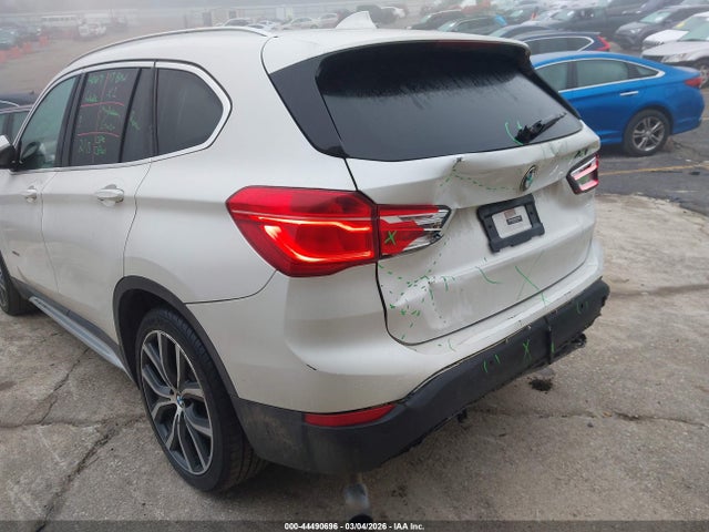 2017 BMW X1 WBXHT3C38H5F70575 Photo 5