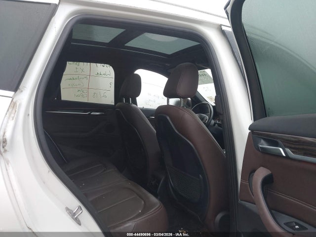 2017 BMW X1 WBXHT3C38H5F70575 Photo 7