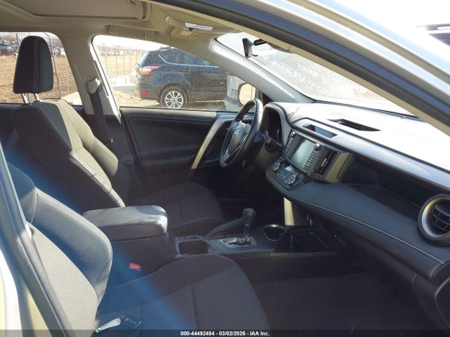 2016 TOYOTA RAV4 HYBRID JTMRJREV5GD034709 Photo 4