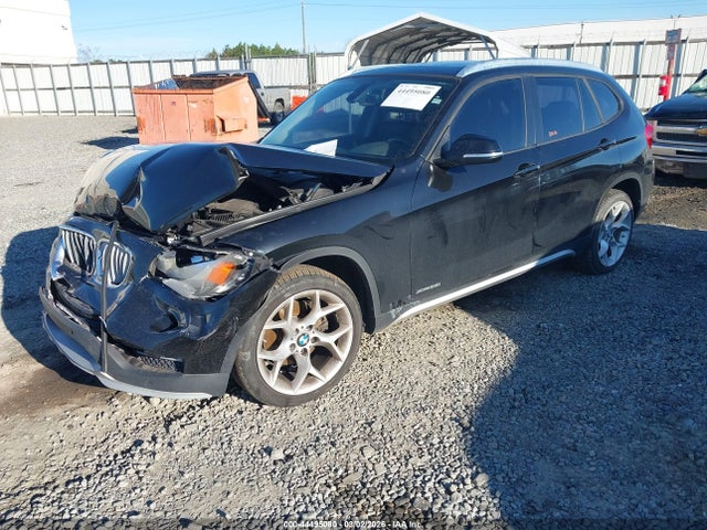 2015 BMW X1 WBAVL1C54FVY34002 Photo 1