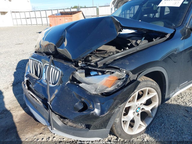 2015 BMW X1 WBAVL1C54FVY34002 Photo 5
