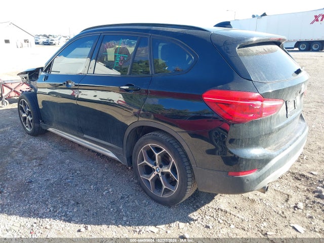 2017 BMW X1 WBXHU7C31H5H37962 Photo 2