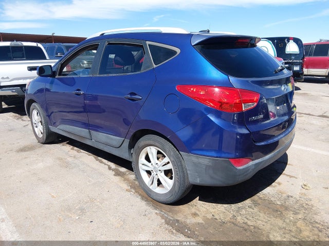 2011 HYUNDAI TUCSON KM8JU3AC2BU257932 Photo 2