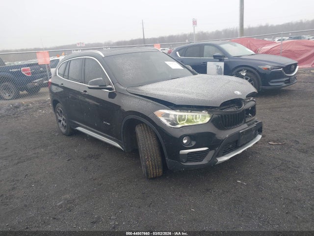 2016 BMW X1 WBXHT3C33G5E47989 Photo 0