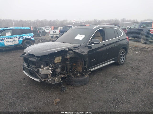2016 BMW X1 WBXHT3C33G5E47989 Photo 1