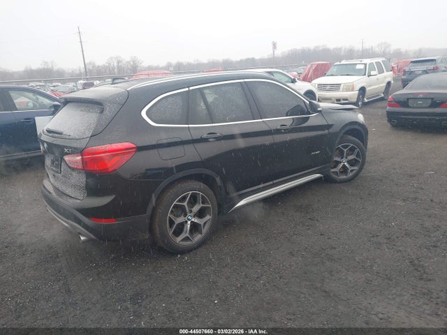 2016 BMW X1 WBXHT3C33G5E47989 Photo 3