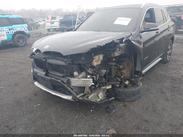 2016 BMW X1 WBXHT3C33G5E47989 Photo 5