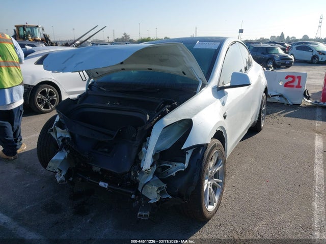2023 TESLA MODEL Y 7SAYGDEE5PF604636 Photo 1