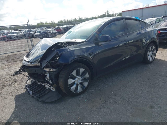 2024 TESLA MODEL Y 7SAYGDEE2RF034663 Photo 1