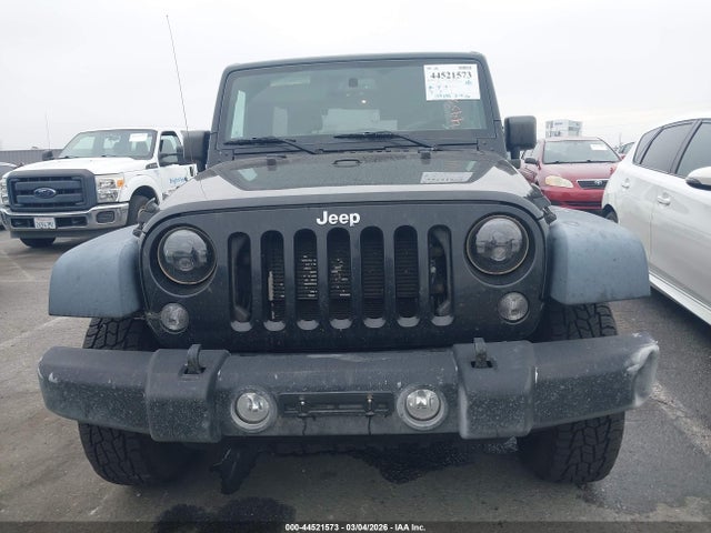 1C4HJWDG5GL208314 Jeep Wrangler Unlimited Sport