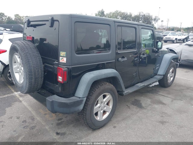 1C4HJWDG5GL208314 Jeep Wrangler Unlimited Sport