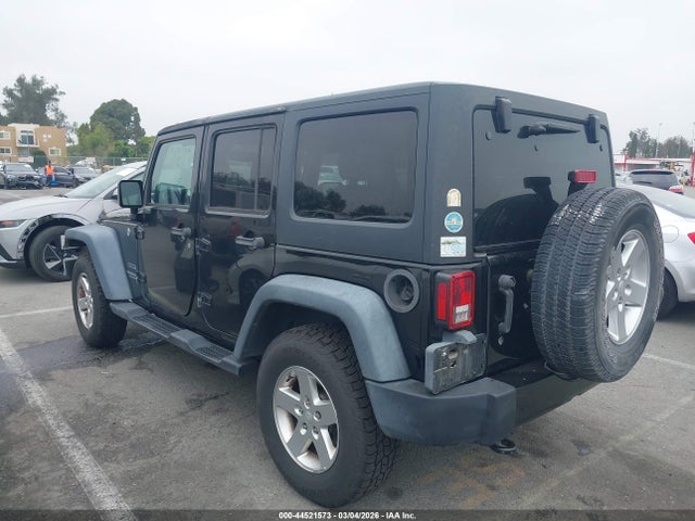 1C4HJWDG5GL208314 Jeep Wrangler Unlimited Sport