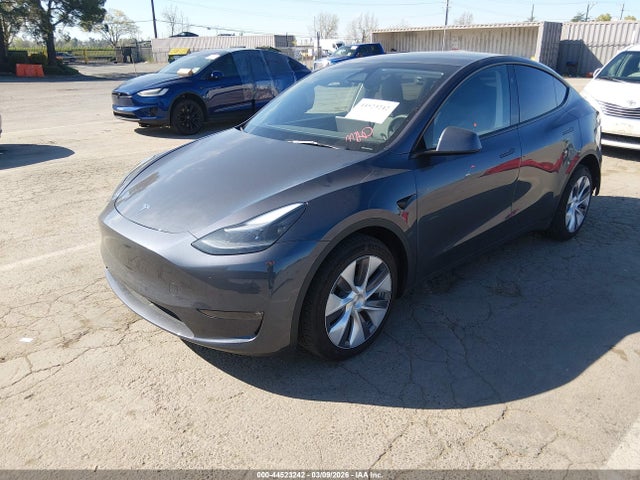 2023 TESLA MODEL Y 7SAYGDEE7PF928378 Photo 1