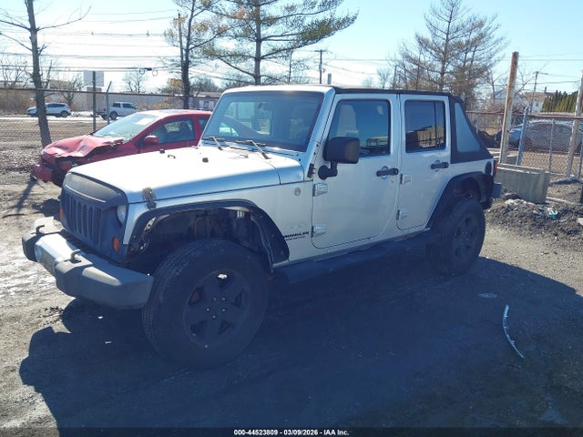 2010 JEEP WRANGLER UNLIMITED 1J4BA5H10AL110072 Photo 1
