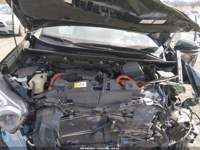 2018 TOYOTA RAV4 HYBRID JTMJJREV1JD194297 Photo 9
