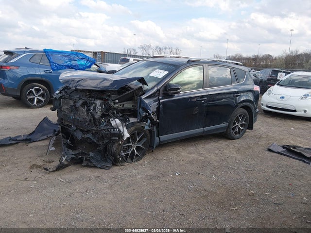 2018 TOYOTA RAV4 HYBRID JTMJJREV1JD194297 Photo 1