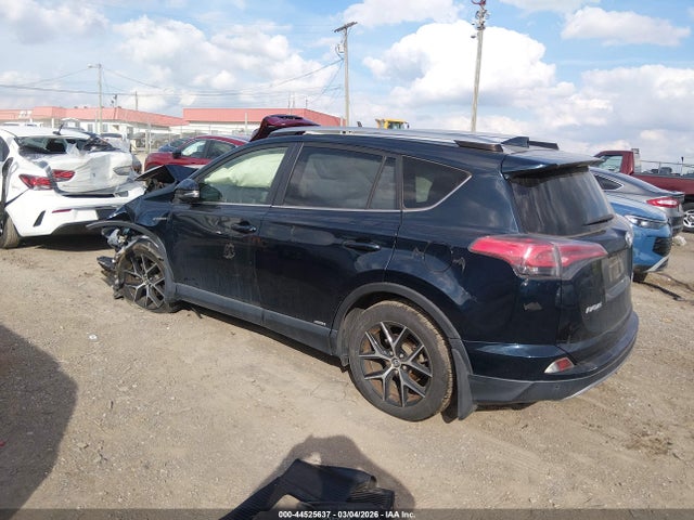 2018 TOYOTA RAV4 HYBRID JTMJJREV1JD194297 Photo 2