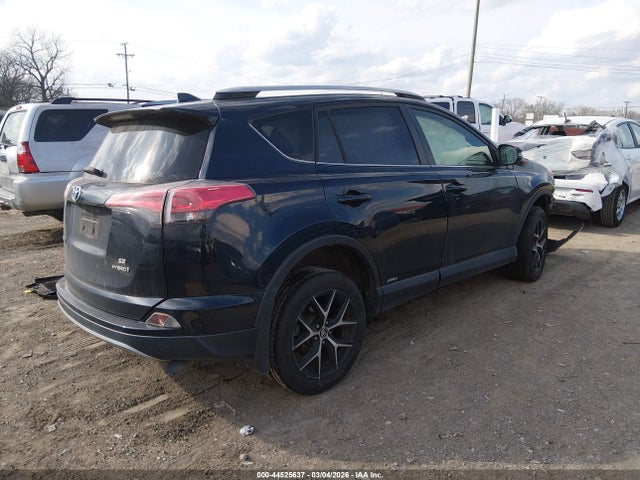 2018 TOYOTA RAV4 HYBRID JTMJJREV1JD194297 Photo 3