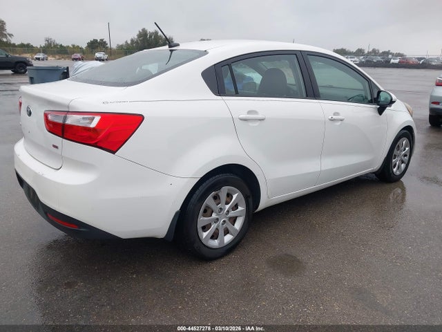 KNADM4A3XE6343809 KIA RIO LX
