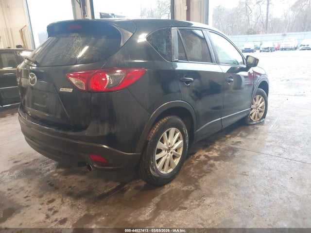 2014 Mazda Cx-5 Touring მანქანა იყიდება აუქციონზე, vin: JM3KE4CY1E0373579, აუქციონის ნომერი: 44527413