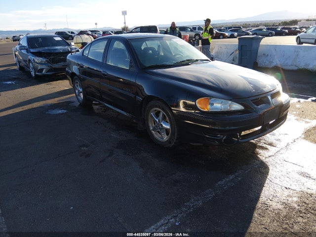 2000 PONTIAC GRAND AM 1G2NW52E1YM763972