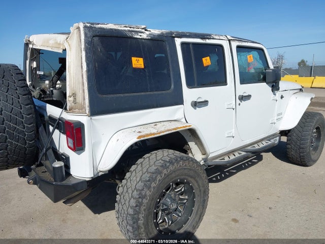 1C4BJWDG7FL634980 Jeep Wrangler Unlimited Sport