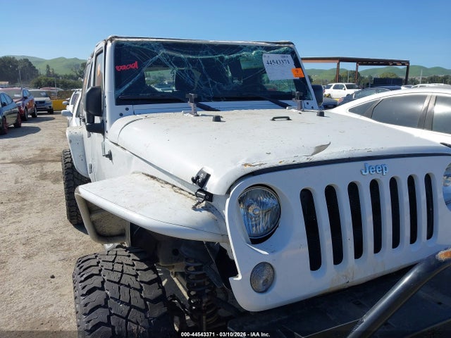 1C4BJWDG7FL634980 Jeep Wrangler Unlimited Sport