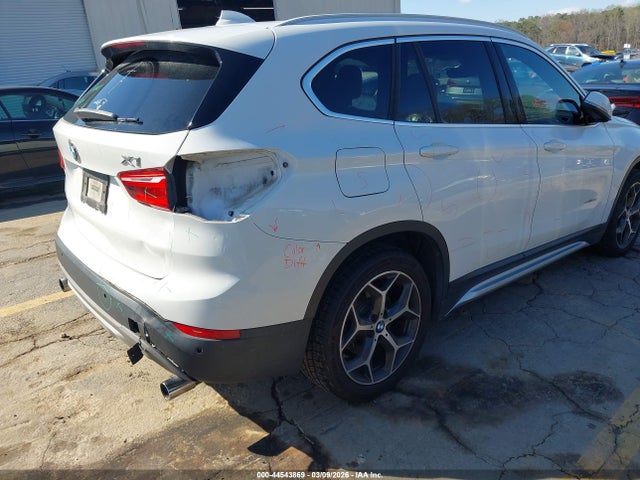 2018 BMW X1 WBXHU7C33J5H42361 Photo 5