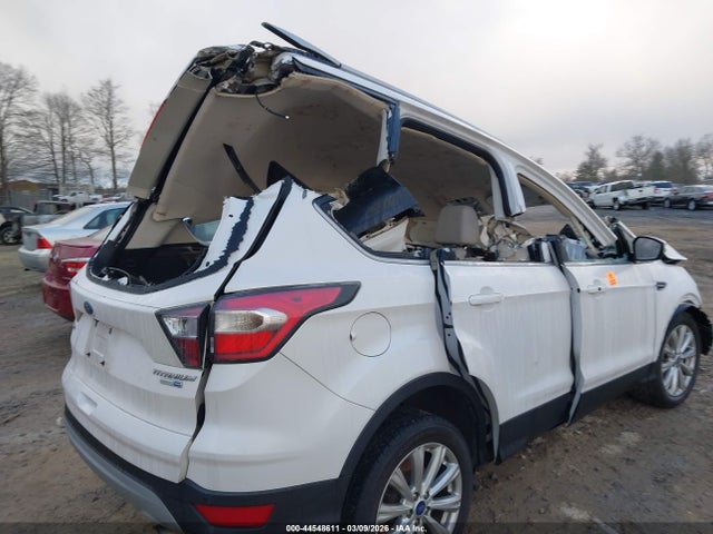 2017 Ford Escape Titanium მანქანა იყიდება აუქციონზე, vin: 1FMCU9J94HUB50843, აუქციონის ნომერი: 44548611