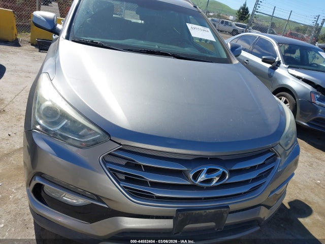 5NMZU3LB3HH015677 Hyundai Santa Fe Sport 2.4l
