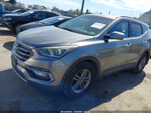 5NMZU3LB3HH015677 Hyundai Santa Fe Sport 2.4l
