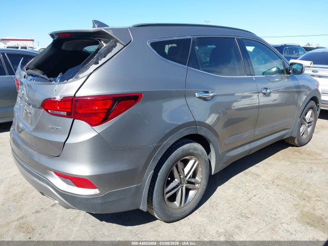 5NMZU3LB3HH015677 Hyundai Santa Fe Sport 2.4l