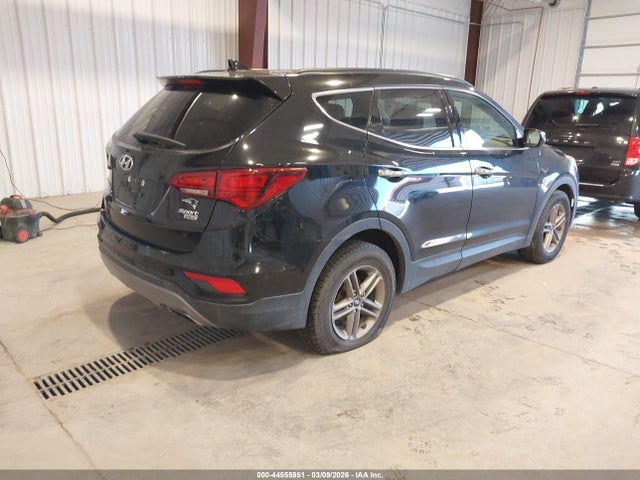 5NMZUDLBXJH054570 Hyundai Santa Fe Sport 2.4l