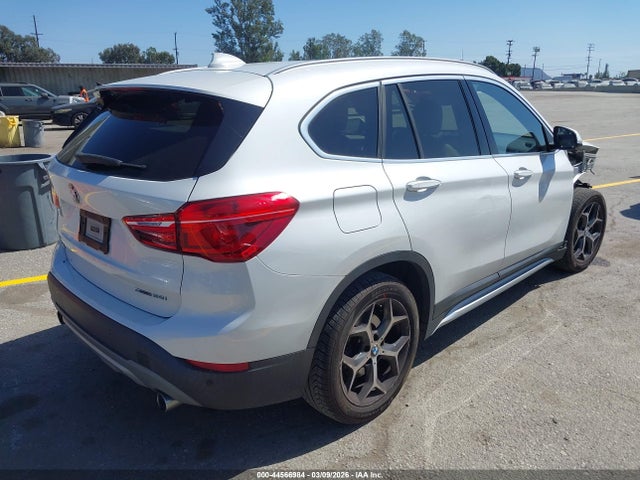 2019 BMW X1 WBXHU7C56K5L11223 Photo 3