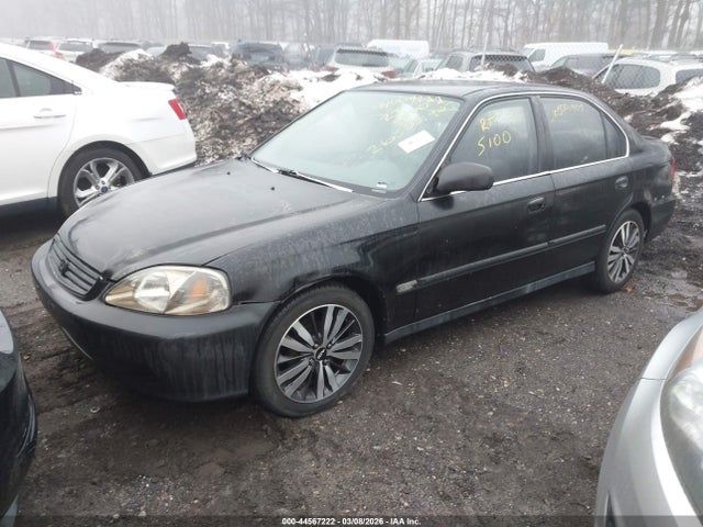 1999 HONDA CIVIC 1HGEJ6678XL059012 Photo 1