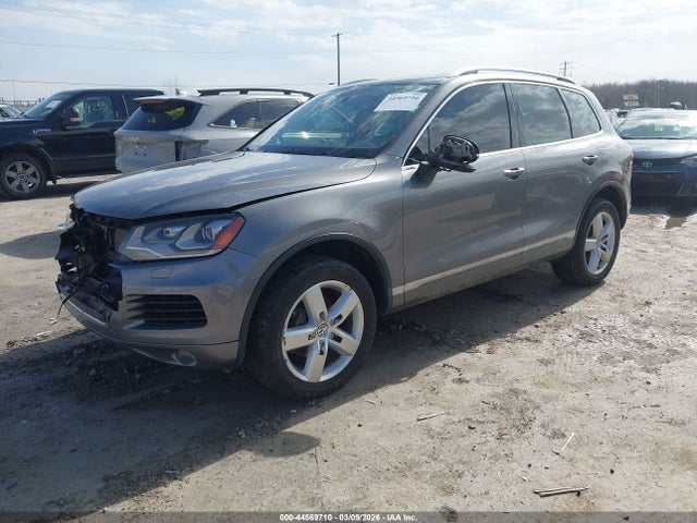 2011 VOLKSWAGEN TOUAREG WVGFF9BP0BD000465 Photo 1