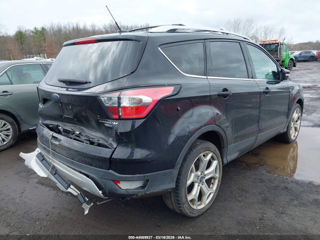 2017 Ford Escape Titanium მანქანა იყიდება აუქციონზე, vin: 1FMCU9J92HUE62658, აუქციონის ნომერი: 44569927