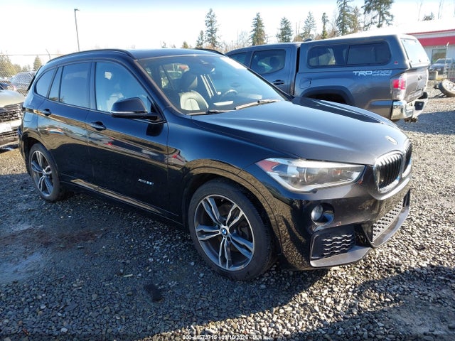2016 BMW X1 WBXHT3C3XG5F65974