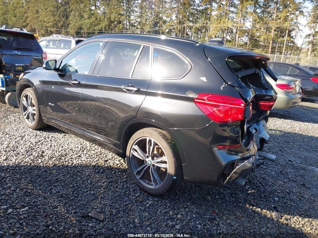 2016 BMW X1 WBXHT3C3XG5F65974 Photo 2