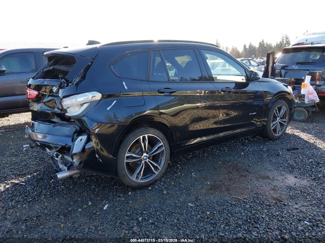 2016 BMW X1 WBXHT3C3XG5F65974 Photo 3